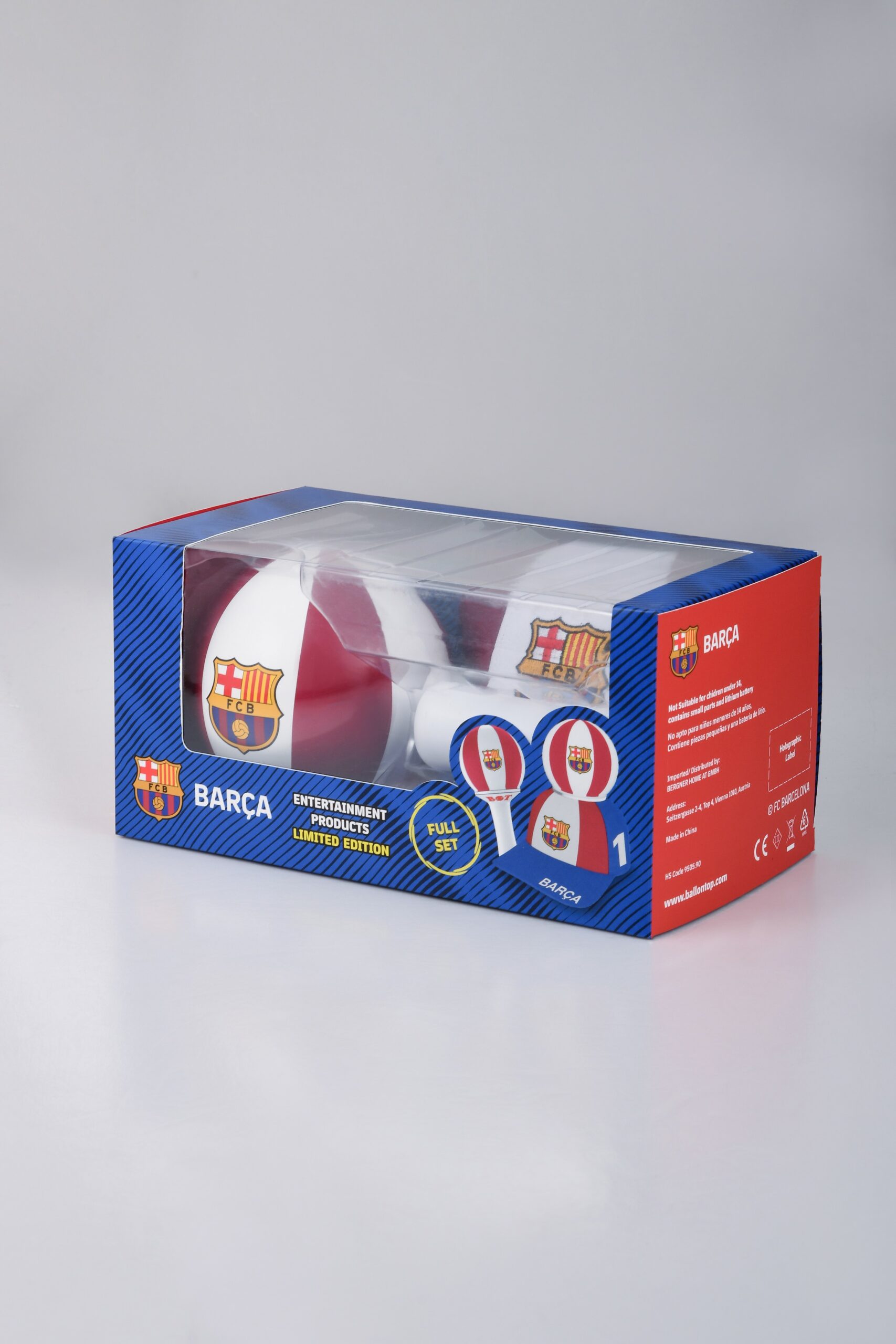 Alien wearing a Ball on Top FC Barcelona cap with an LED ball on top.